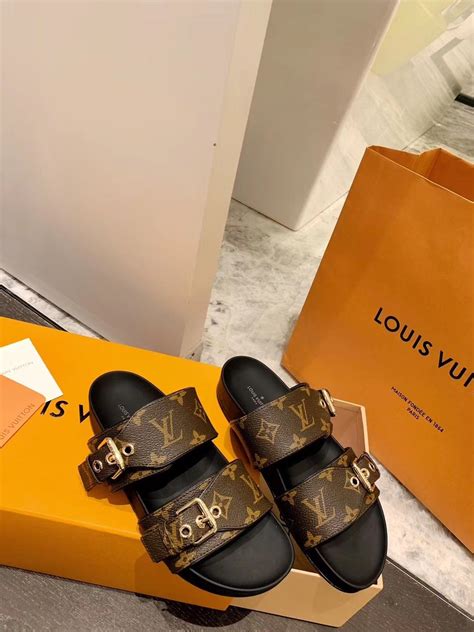 slip on louis vuitton blanc et marine|louis vuitton women's mules.